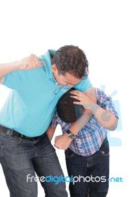 Young Kid About To Be Thumped By Father Stock Photo
