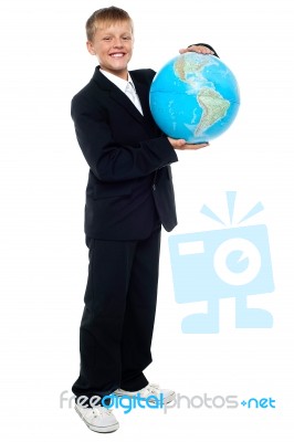 Young Kid Holding Globe Stock Photo