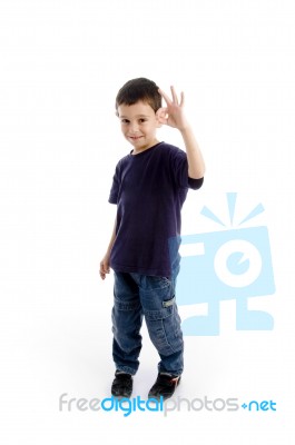 Young Kid With Okay Hand Gesture Stock Photo