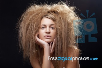 Young Lady Cupping Her Face Stock Photo