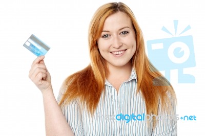 Young Lady Displaying Her Cash Card Stock Photo