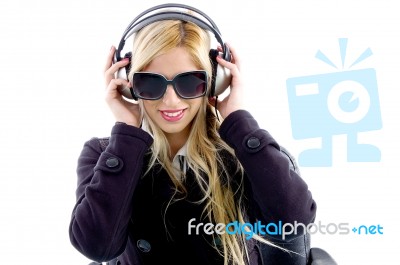 Young Lady Enjoying Music Stock Photo