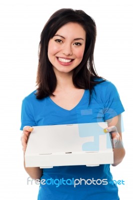 Young Lady Holding Pizza Box Stock Photo