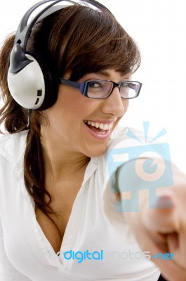 young lady Listening Music Stock Photo