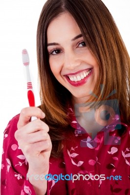 Young Lady Posing With Toothbrush Stock Photo