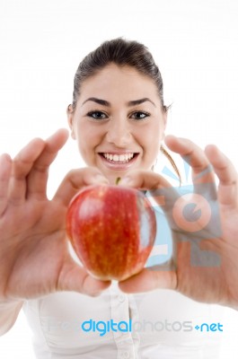 Young Lady Showing Red Apple Stock Photo