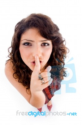 Young Lady With Silence Gesture Stock Photo