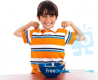 Young Little Boy Showing His Strength Stock Photo