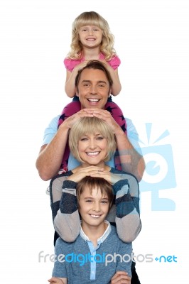 Young Lovable Happy Family Stock Photo