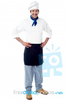 Young Male Chef, Hands On Waist Stock Photo