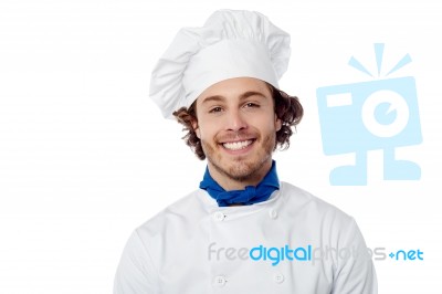 Young Male Chef Wearing Toque Stock Photo