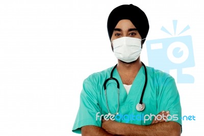 Young Male Doctor With Face Mask Stock Photo