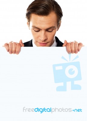 Young Male Holding Blank Board Stock Photo