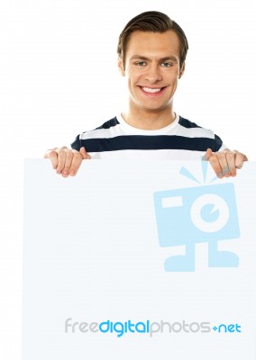 Young Male Holding Blank Board Stock Photo