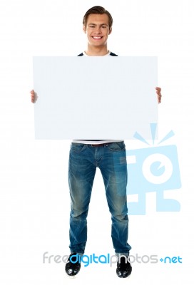 Young Male Holding Blank Board Stock Photo