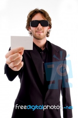 Young Male Holding Business Card Stock Photo