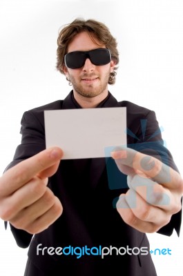 Young Male Holding Business Card Stock Photo