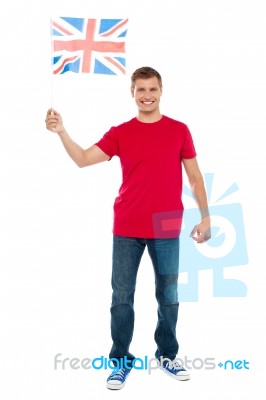 Young Male Holding UK Flag Stock Photo