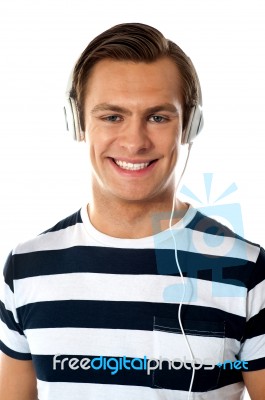 Young Male Listening Music Stock Photo