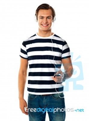 Young Male Listening Music Stock Photo