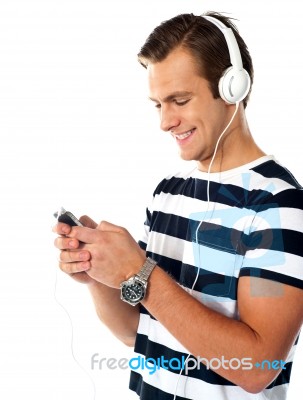 Young Male Listening Music Stock Photo