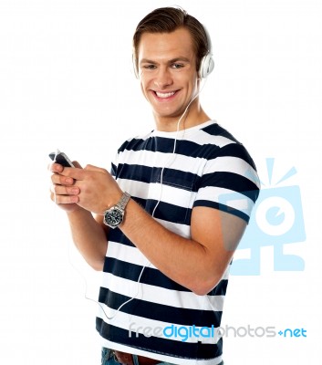 Young Male Listening Music Stock Photo