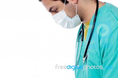 Young Male Physician Wearing Surgical Mask Stock Photo