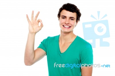 Young Male Showing Ok Sign Stock Photo