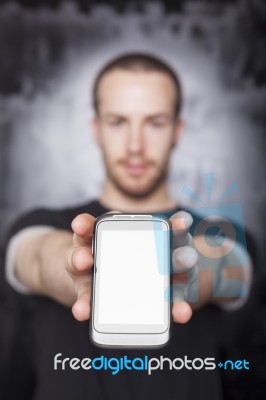 Young Male Showing Smartphone Stock Photo