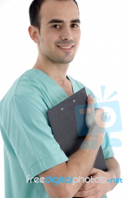 Young Male Surgeon with clipboard Stock Photo