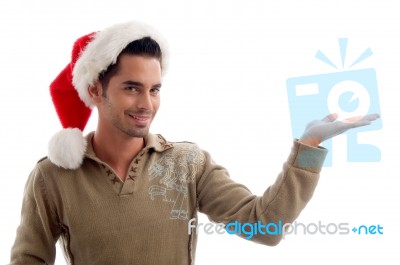 Young Male Wearing Christmas Hat Stock Photo