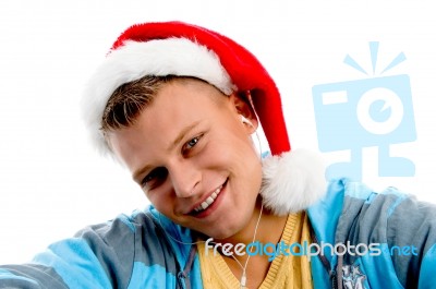 Young Male Wearing Christmas Hat Stock Photo