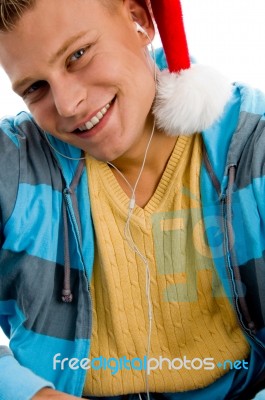 Young Male Wearing Christmas Hat Stock Photo