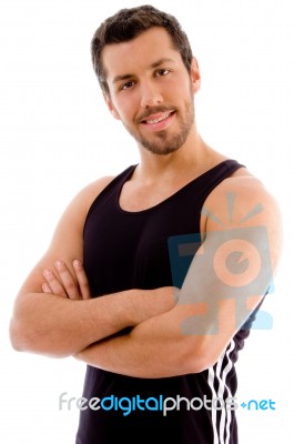 Young Male With Arms Crossed Stock Photo