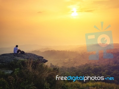 Young Man  Asia Tourist  At Mountain Is Watching Over The Misty Stock Photo