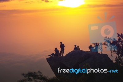 Young Man  Asia Tourist  At Mountain Is Watching Over The Misty Stock Photo