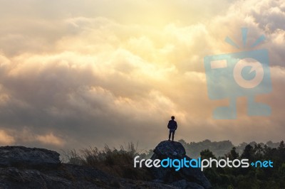 Young Man  Asia Tourist  At Mountain Is Watching Over The Misty Stock Photo