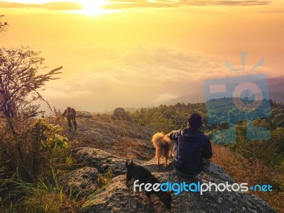 Young Man  Asia Tourist  At Mountain Is Watching Over The Misty Stock Photo