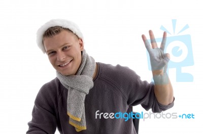 Young Man Counting Fingers Stock Photo