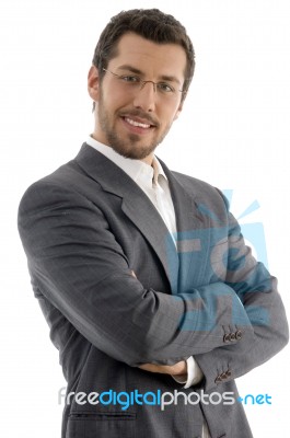 Young Man Crossing Arm Stock Photo