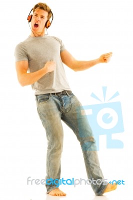 Young Man Dancing With Headphone Stock Photo