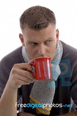 Young Man Drinking Coffee Stock Photo