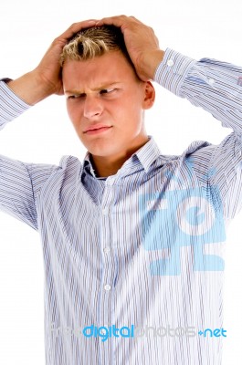 Young Man In Tension Stock Photo