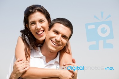 Young Man Piggyback His Girlfriend Stock Photo