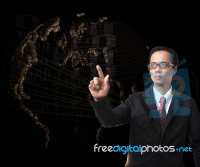 Young Man Pointing To World Digital Map Stock Photo