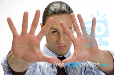 Young Man Posing With Open Palms Stock Photo