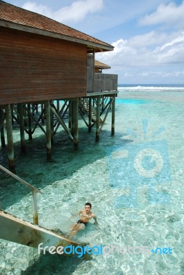 Young Man Relaxing In Maldives Stock Photo