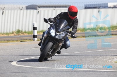 Young Man Riding Motorcycle In Asphalt Road Curve Use For Male A… Stock Photo