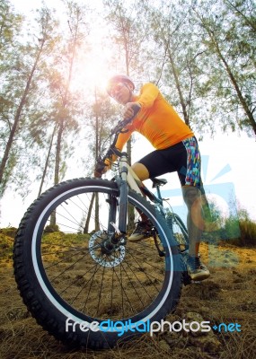 Young Man Riding Mountain Bike Mtb On Dirt Dune Use For Men Leis… Stock Photo