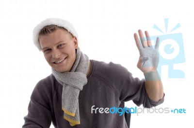 Young Man Showing Four Fingers Stock Photo